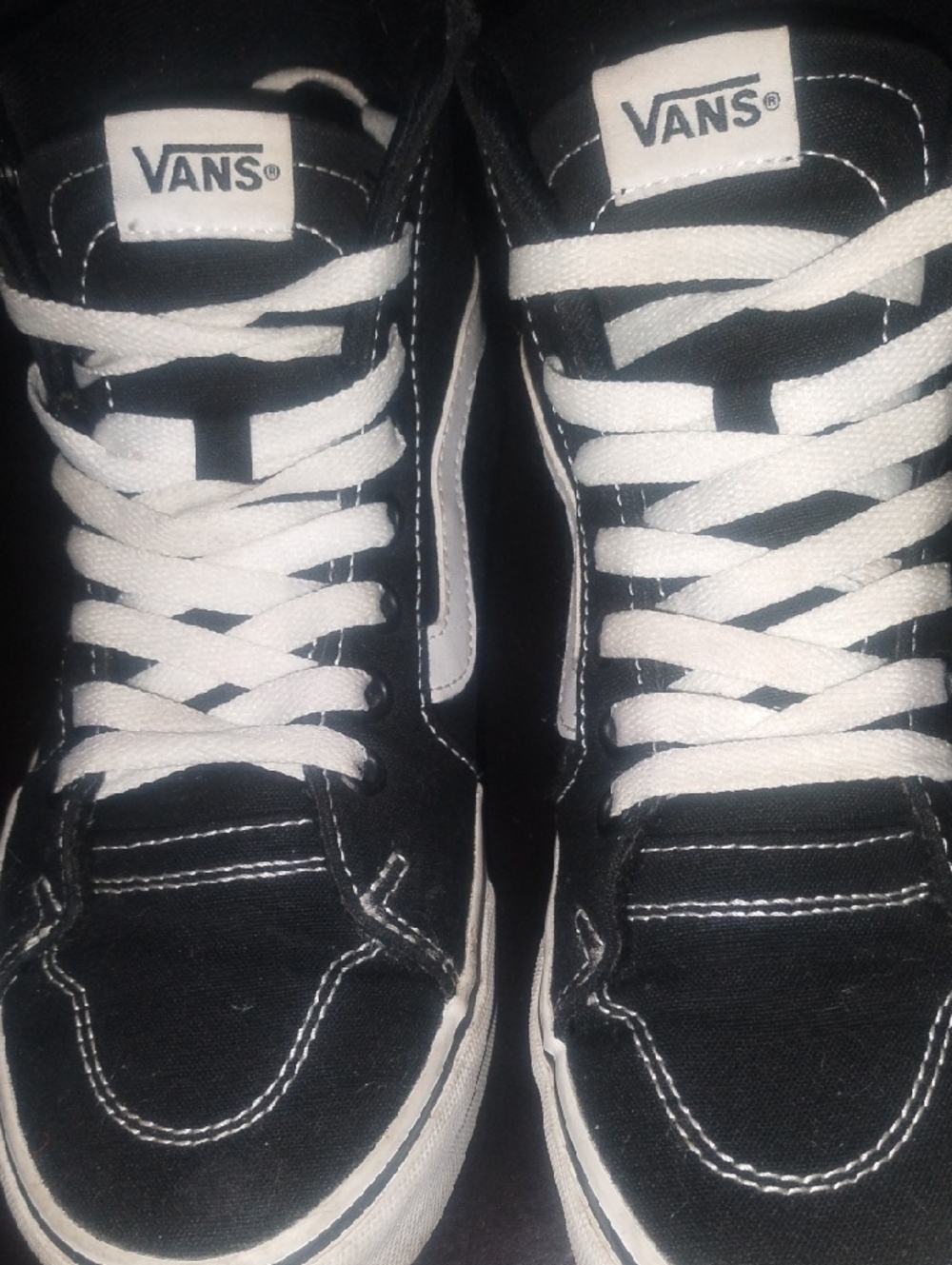 Vans Black and White High-Top Skate Sneakers